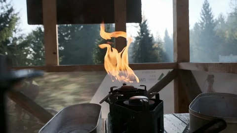 Red flame of a portable gas camping burner close-up Stock Footage 127854606