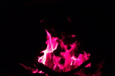 Red flames in bonfire on black background Stock Photos
