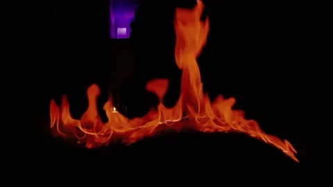 Red flames in darkness close-up Video stock 76687865