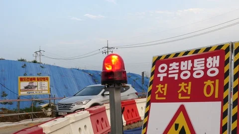 Red flash light in roadworks and protection guide Stock Footage