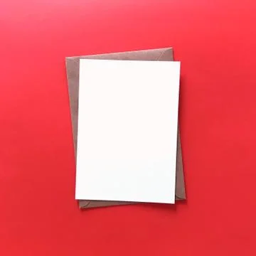 Red Flat Lay Blank Postcard with Envelope Mock Up Stock Photos