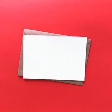 Red Flat Lay Blank Postcard with Envelope Mockup Stock Photos