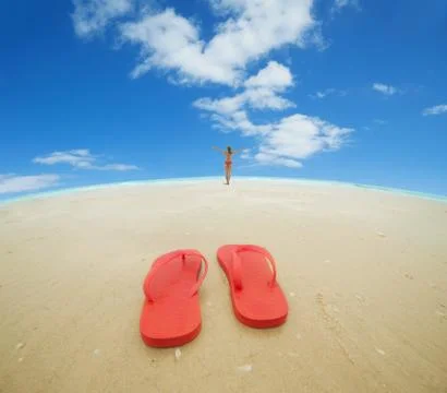 Red flip flops on the beach Stock Photos