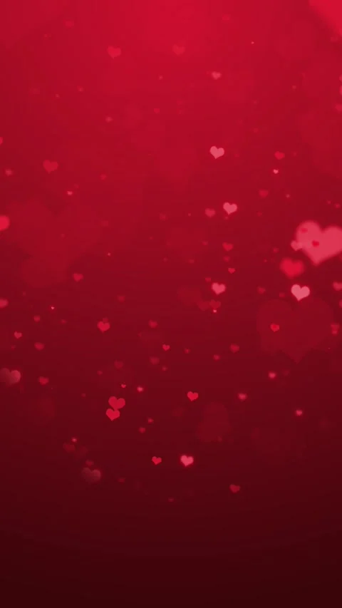 Red floating hearts romantic background with soft bokeh shapes, warm gradient gl Stock Footage 340554435