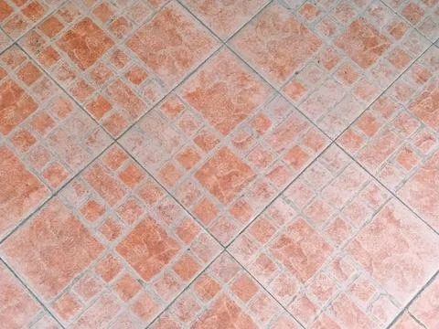 Red floor tiles. Pattern from blocks. Paving stones. Stock Photos