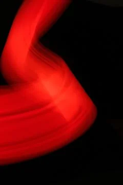 Red flow on a black background Stock Photos
