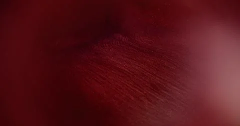Red flow ink blur shimmer pigment shiny water art Stock Photos