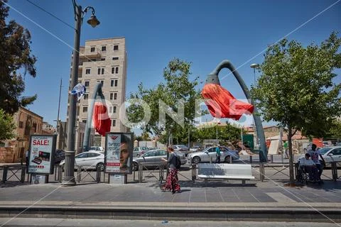 Red flowers tourist attraction on the Mahane Yehuda square in Jerusalem Stock Photos
