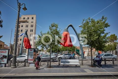 Red flowers tourist attraction on the Mahane Yehuda square in Jerusalem Stock Photos