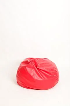Red foam sofa on white isolate scene Stock Photos