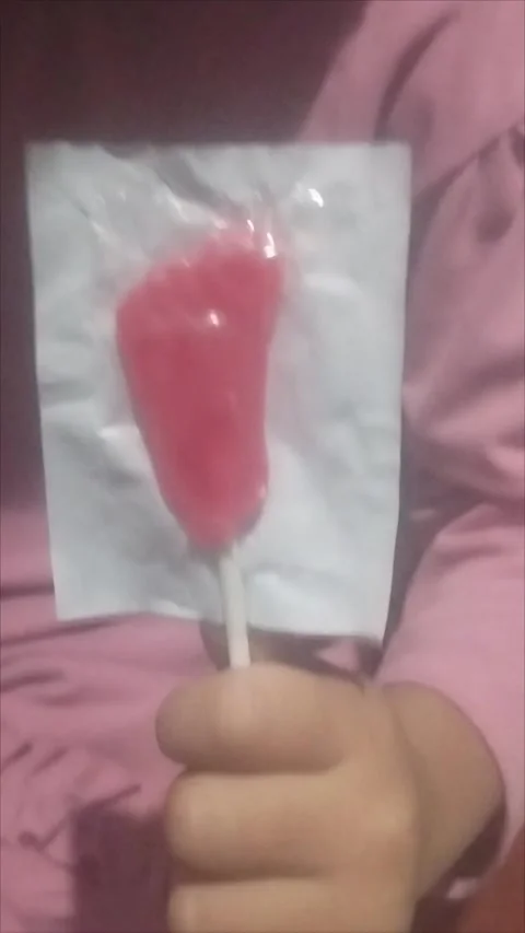 Red foot candy from the old days when I was little Stock Footage 296102369
