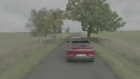 Red Ford Mustang Mach E4X in Nature-D-Log Video stock 219249051