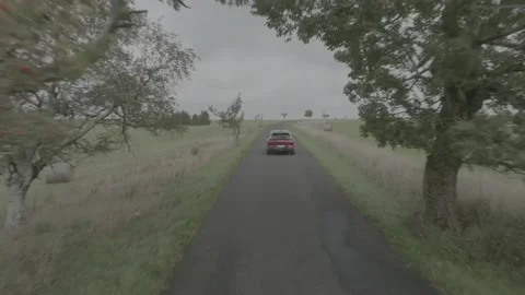Red Ford Mustang Mach E4X in Nature-D-Log Video stock 219249061