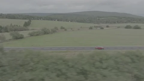 Red Ford Mustang Mach E4X in Nature-D-Log Video stock 219249083