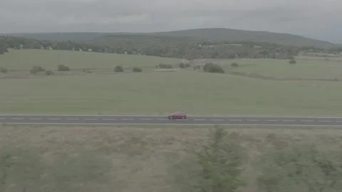 Red Ford Mustang Mach E4X in Nature-D-Log Video stock 219249089