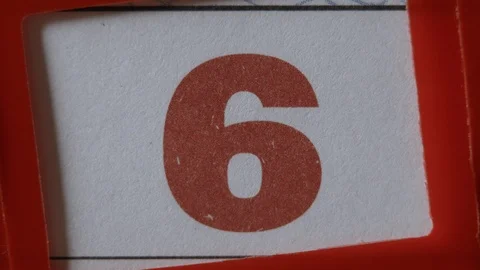 Red Frame Moves On The Calendar. The 6 Red Day Of The Calendar. Vídeos de archivo 106710072