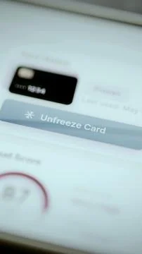 Red freeze card button under compromised status Stock Photos