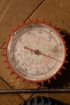 Red freon manometer close up. Stock Photos