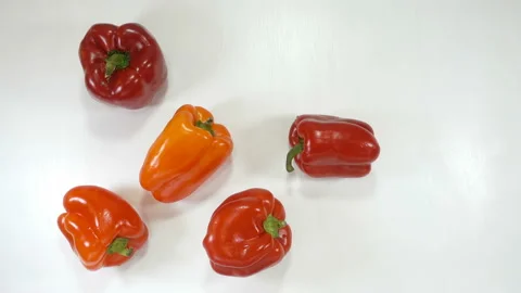 Red fresh bell pepper falling in 4K Stock Footage 146665427