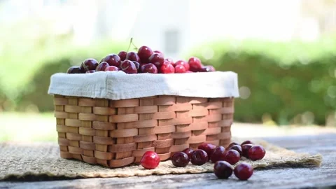Red fresh Cherries in basket with cell napkin 스톡 동영상 156045756