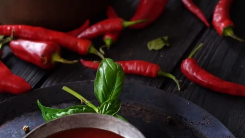 Red Fresh Organic Chilli Pepper  On Wooden Table Video stock 111533953