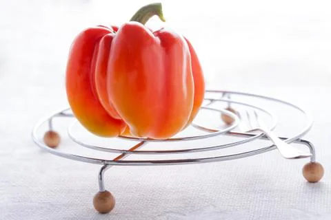 Red Fresh Pepper on the white table Stock Photos