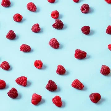 Red fresh ripe raspberry pattern. Summer concept. Stock Photos