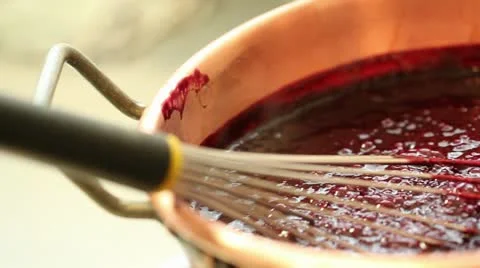 Red fruit marmalade in copper pot pan right Stock-Footage 11404162