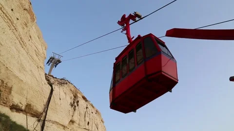 Red funicular cable ride at Rosh Hanikra mountains Stock Footage 62425584