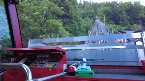Red Funicular Train driving downhill from Harder Kulm, Top of Interlaken Vidéo 158938948