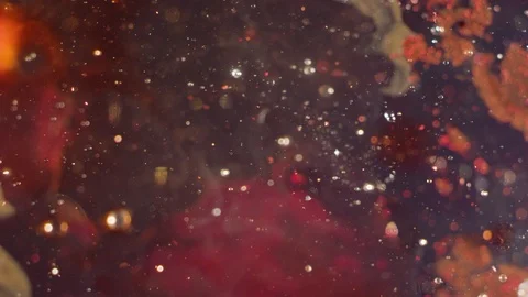 Red galaxy particles reaction abstract liquid texture background Video stock 118301086