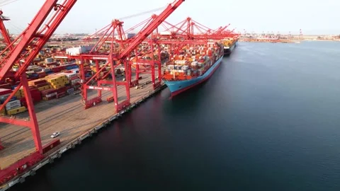 Red Gantry Cranes and Cargo Ships at Port, 4K Stock Footage 160313426