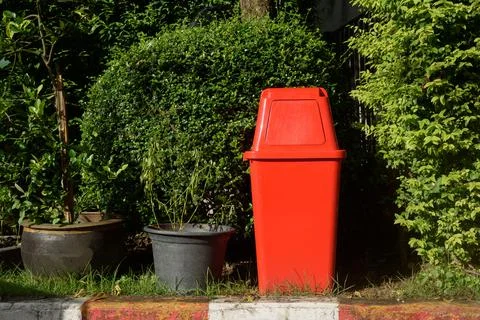 Red garbage bin Stock Photos