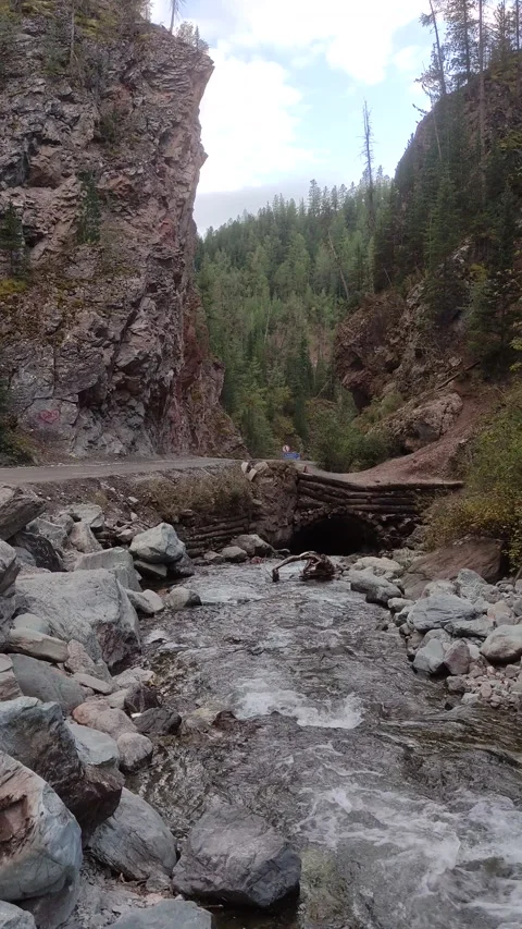 Red Gate is a narrow winding passage between sheer red cliffs. Stock Footage 283839098