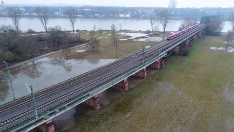 Red German S-Bahn train - aerial view Stock Footage 84511296