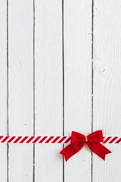 Red gift bow with ribbon table . High quality and resolution beautiful photo Stock Photos