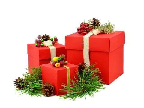 Red gift box and pine branches. Isolation. Christmas. Foto stock