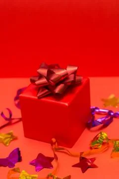 Red gift box red background Stock Photos