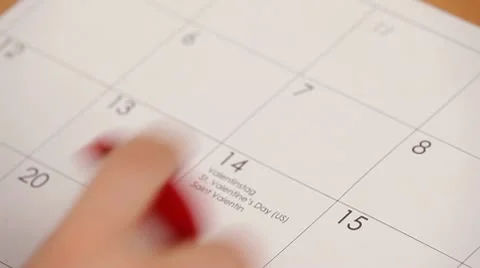 Red gift box in the shape of a heart. HD Video stock 10574250