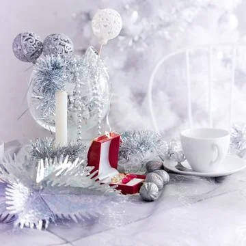 Red gift box on the table in winter decorations Stock Photos
