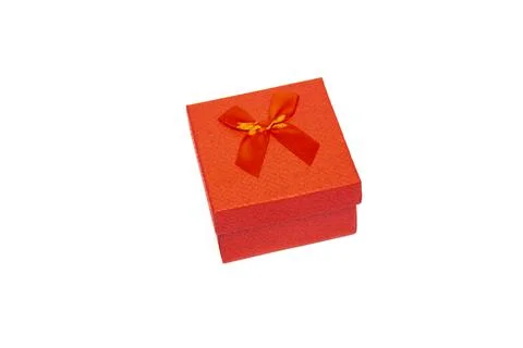 Red gift box on a white background. Stock Photos
