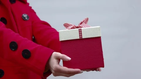 Red gift box with white ribbon. Stock Footage