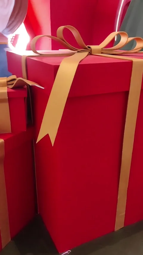 Red gift boxes with gold ribbons Stock Footage 259535408