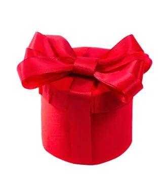 Red gift with a red bow. isolate on white background Stock Photos