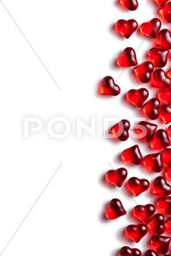 Red glass hearts on white background Stock Photos