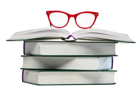Red glasses on open book Stock Photos