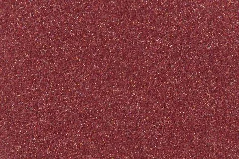 Red glitter background, texture. Low contrast photo. Stock Photos