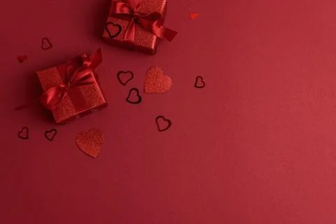 Red Glitter Gift Boxes and Hearts on Festive Background for Valentines Day .. Stock Photos