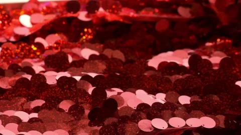 Red glitter sequins as a background, fabric. Stock Footage 131781017