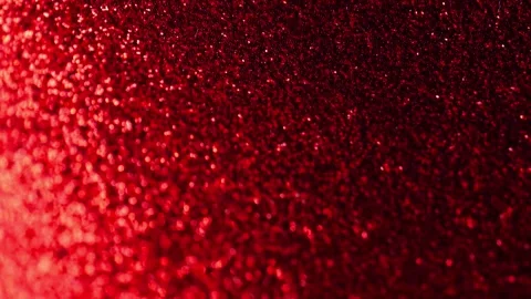 Red glitter texture background.New Year and Christmas festive wallpaper. Stock Footage 320949514